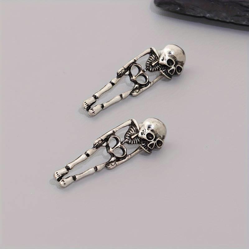 2 li Exquisite Skeleton Design Dangle Küpe